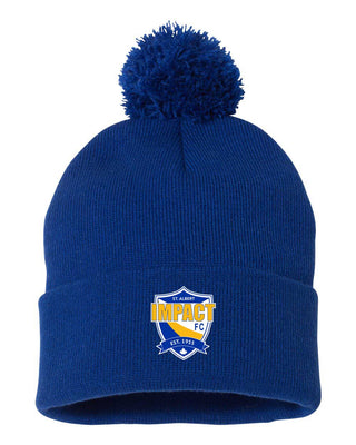 A blue beanie with a pom-pom on top, featuring a white and yellow embroidered logo on the folding cuff.