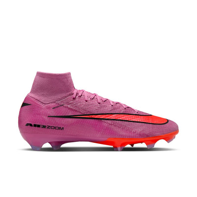 Pink soccer cleat with red accents on a white background Nike Mercurial Superfly 10 Elite Firm-Ground Soccer Cleats